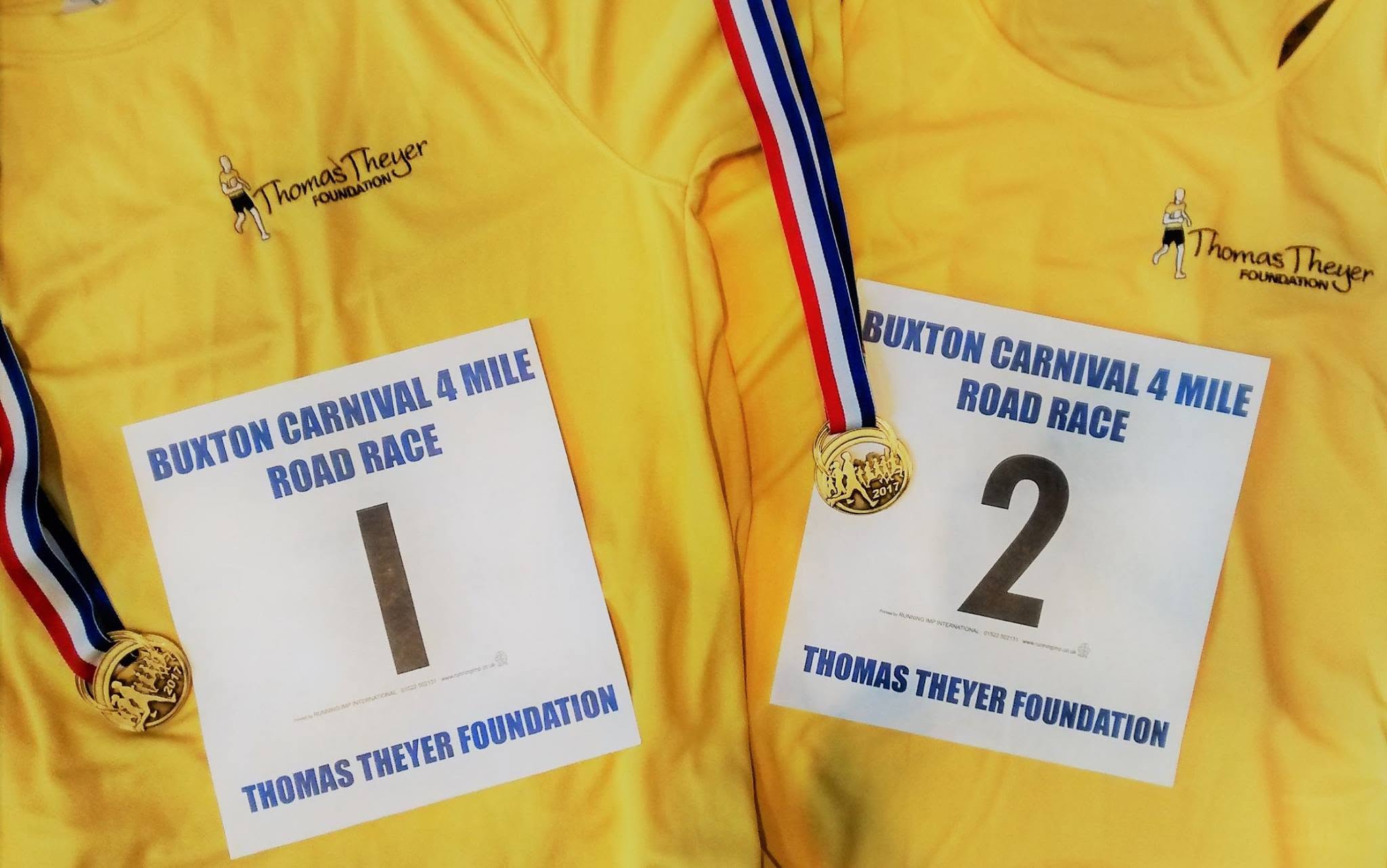 Buxton Carnival 4 race numbers, medals and yellow running vests