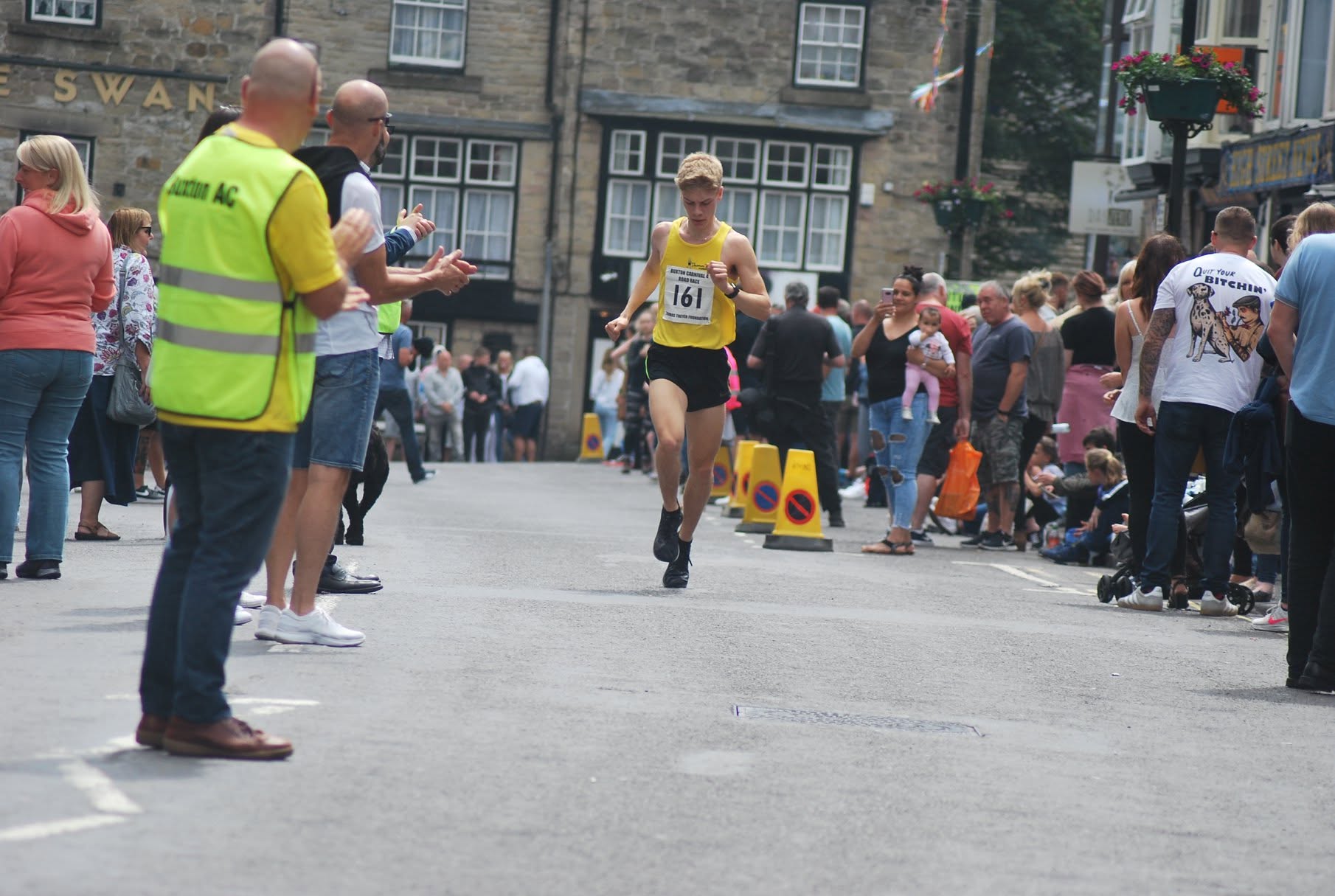 A runner racing through Buxton town centre