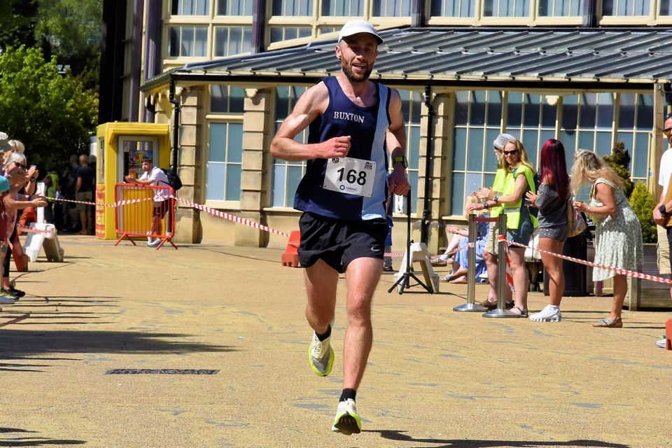 A Buxton AC runner finishing in Pavilion Gardens