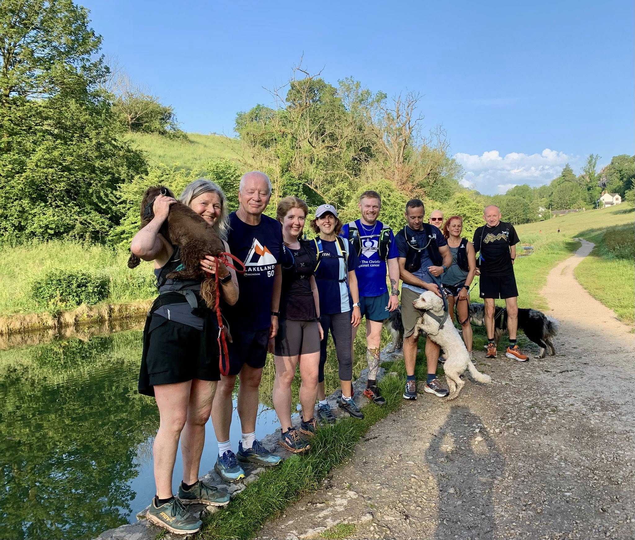 Club members pausing beside a Peak District canal