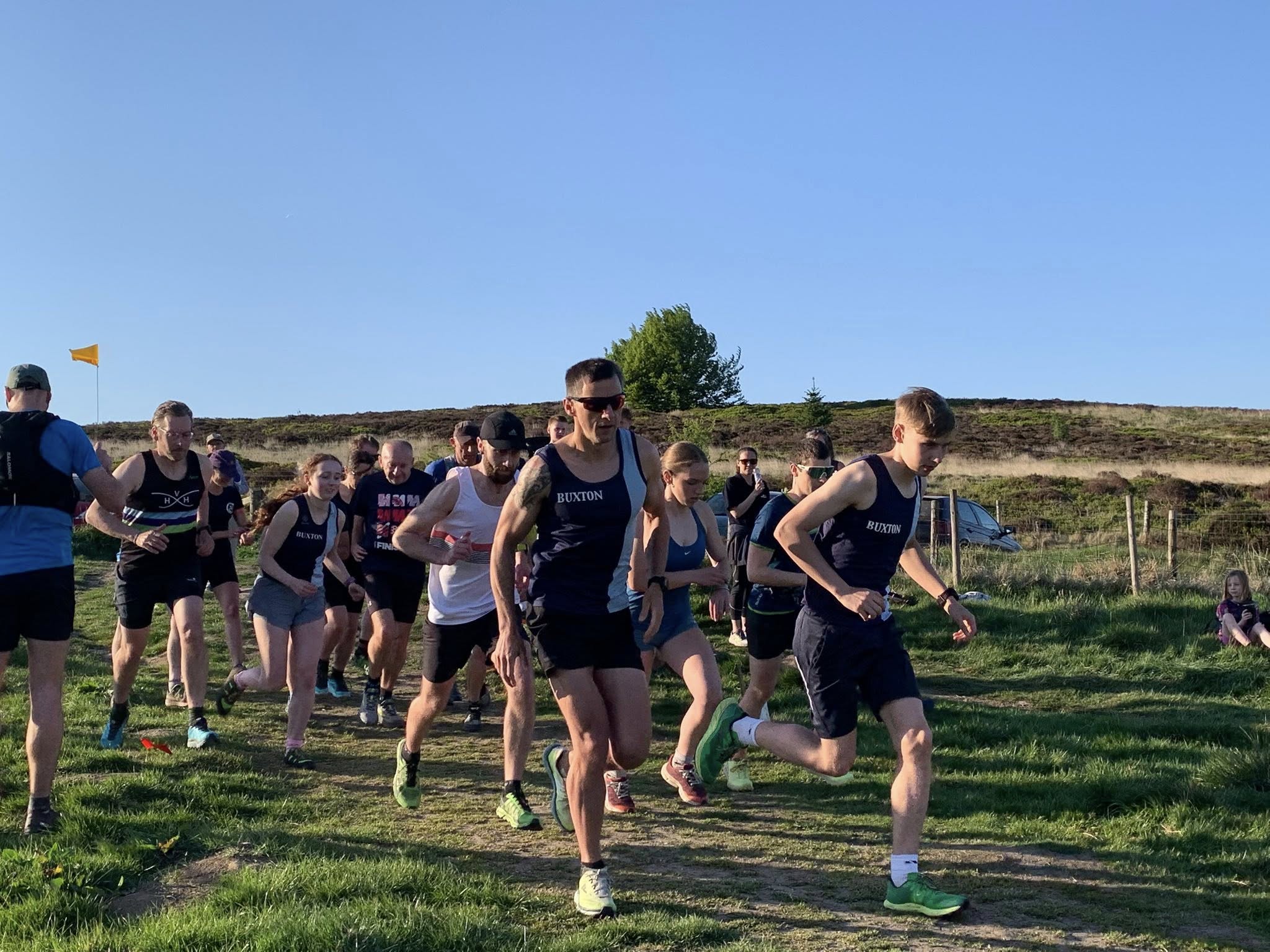 Runners setting off across the Peak District