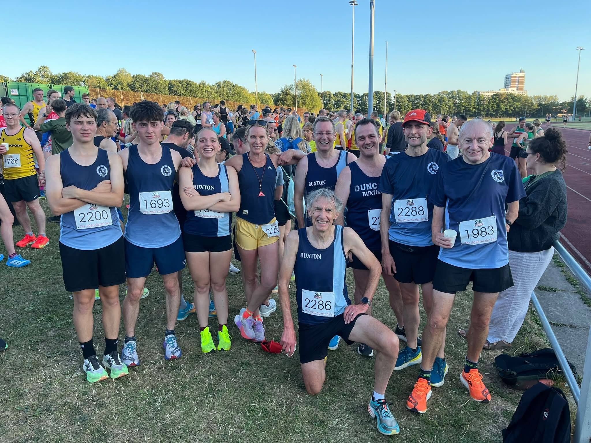 Buxton AC runners together at the athletics track